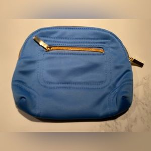 Blue make up/travel bag. Squared by Sondra Roberts.  Zippered pocket.